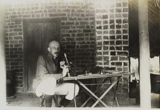 JL Todd with a microscope during an expedition to the Congo, ca. 1903